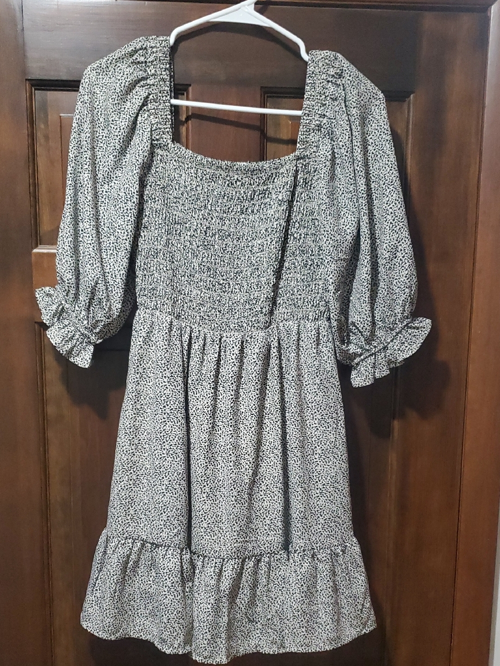 Sienna Sky Black and Tan Animal Print Smocked Mini Dress